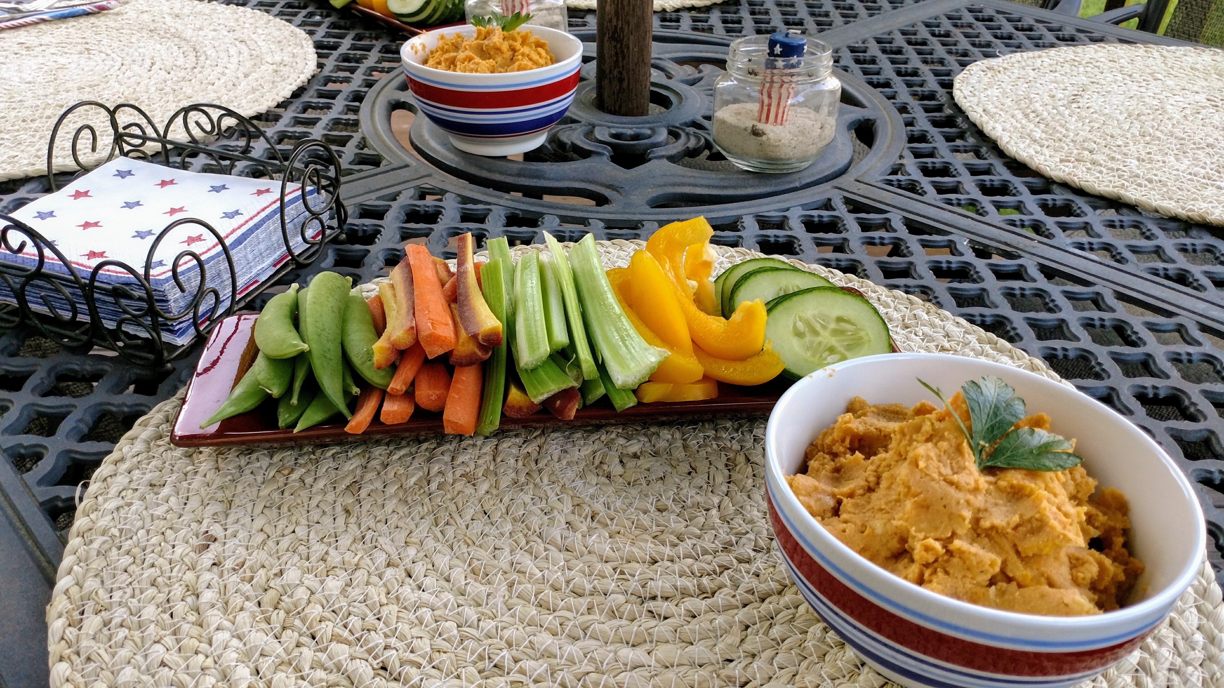 sweet potato hummus served on table with vegetables